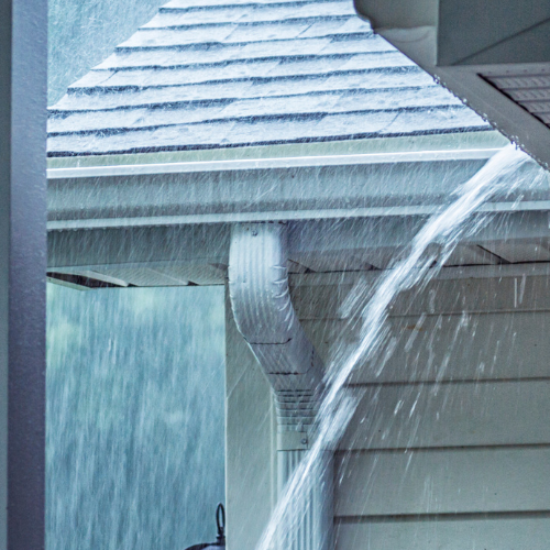 Rain falling off a roof